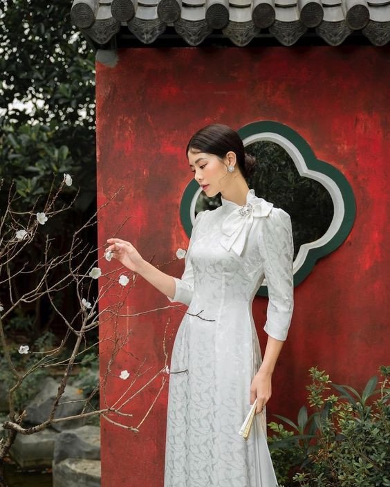 Áo dài trắng gạo tay lỡ